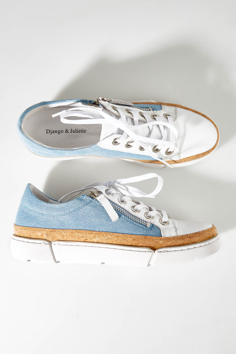A model wearing size 37 of the Torry Sneaker in colour Whtdenim (White), from the front, showing the whole outfit