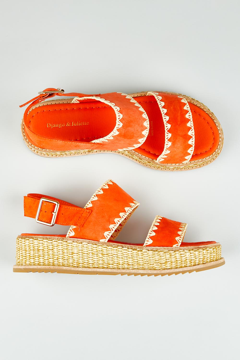 A model wearing size 37 of the Vera Suede Leather Flatform in colour Okorange, from the front, showing the whole outfit