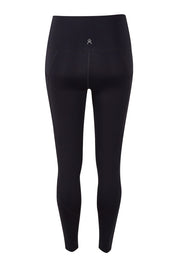 Product shot of the Essential Tight Full Length in colour Black (Black), from the back