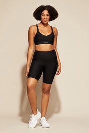 A model wearing the Say Something Crop in colour Black (Black), from the front, showing the whole outfit