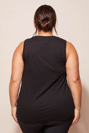 A model wearing the Champion Tank in colour Black (Black), from the back