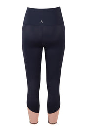 Product shot of the Turbulence Tight in colour Navypink (Blue), from the back