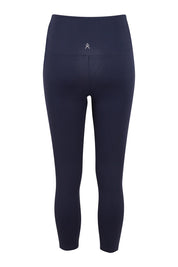 Product shot of the Harlow Ribbed Tight in colour Navy (Blue), from the back
