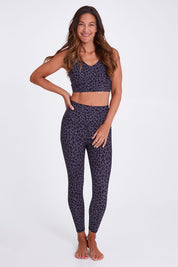 Model Alex wearing the Utopia Tight in colour Leopardsmk (Grey), from the front, showing the whole outfit