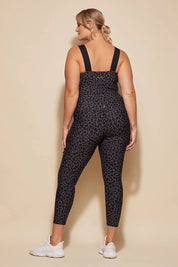 A model wearing the Utopia Tight in colour Leopardsmk (Grey), from the front, showing the whole outfit