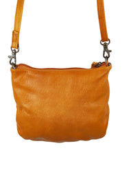 Product shot of the Castle In The Sky Leather Bag in colour Tan, from the back