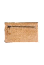 Product shot of the Mila Leather Foldover Purse in colour Sand, from the back