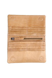 Product shot of the Mila Leather Foldover Purse in colour Sand, detail