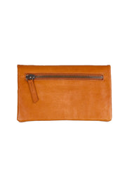 Product shot of the Mila Leather Foldover Purse in colour Tan, from the back