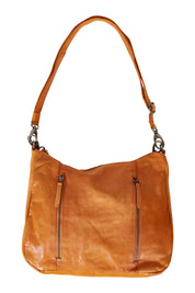 Product shot of the Poppy Leather Bag in colour Tan, from the back