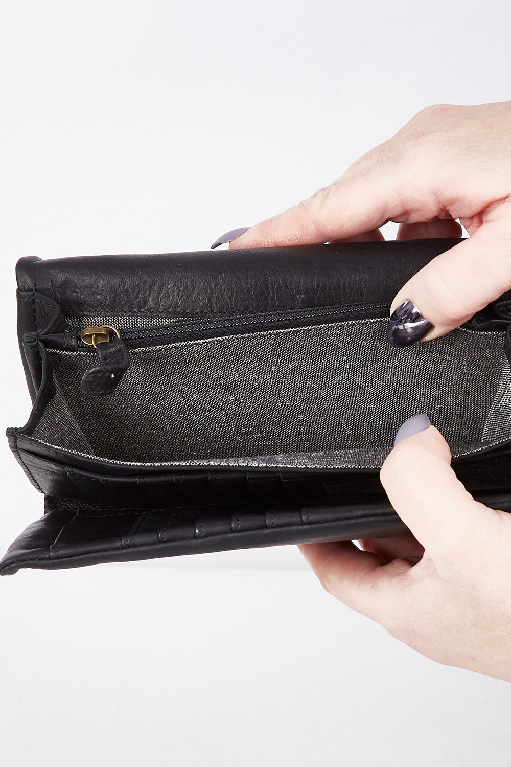 A model wearing size OneSize of the Rose Leather Purse in colour Black (Black), from the front, showing the whole outfit