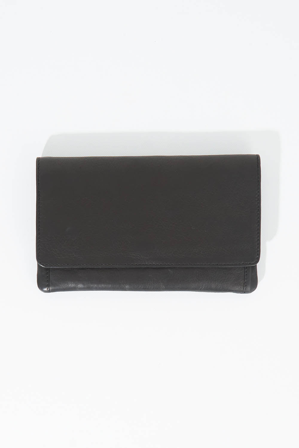 A model wearing size OneSize of the Sirena Leather Purse in colour Black (Black), from the front, showing the whole outfit