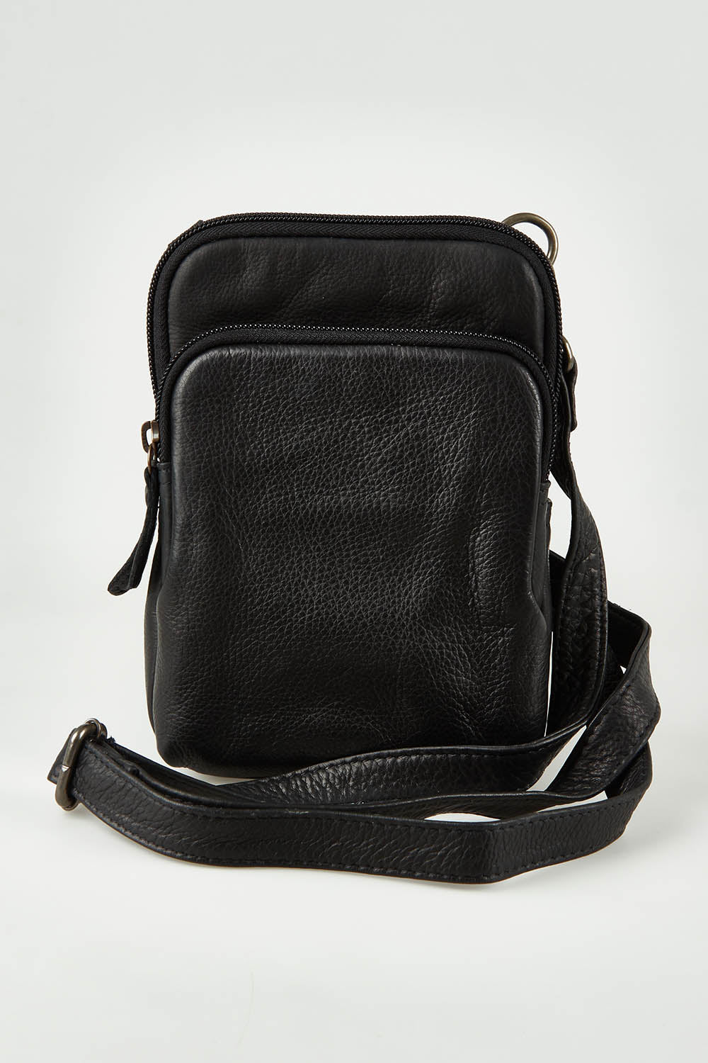 A model wearing the Sophie Small Leather Bag in colour Black (Black), from the front, showing the whole outfit
