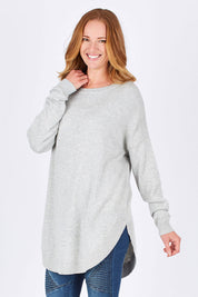 Model Katie wearing size OneSize of the Eden Knit in colour Marle (Grey), from the front, cropped image