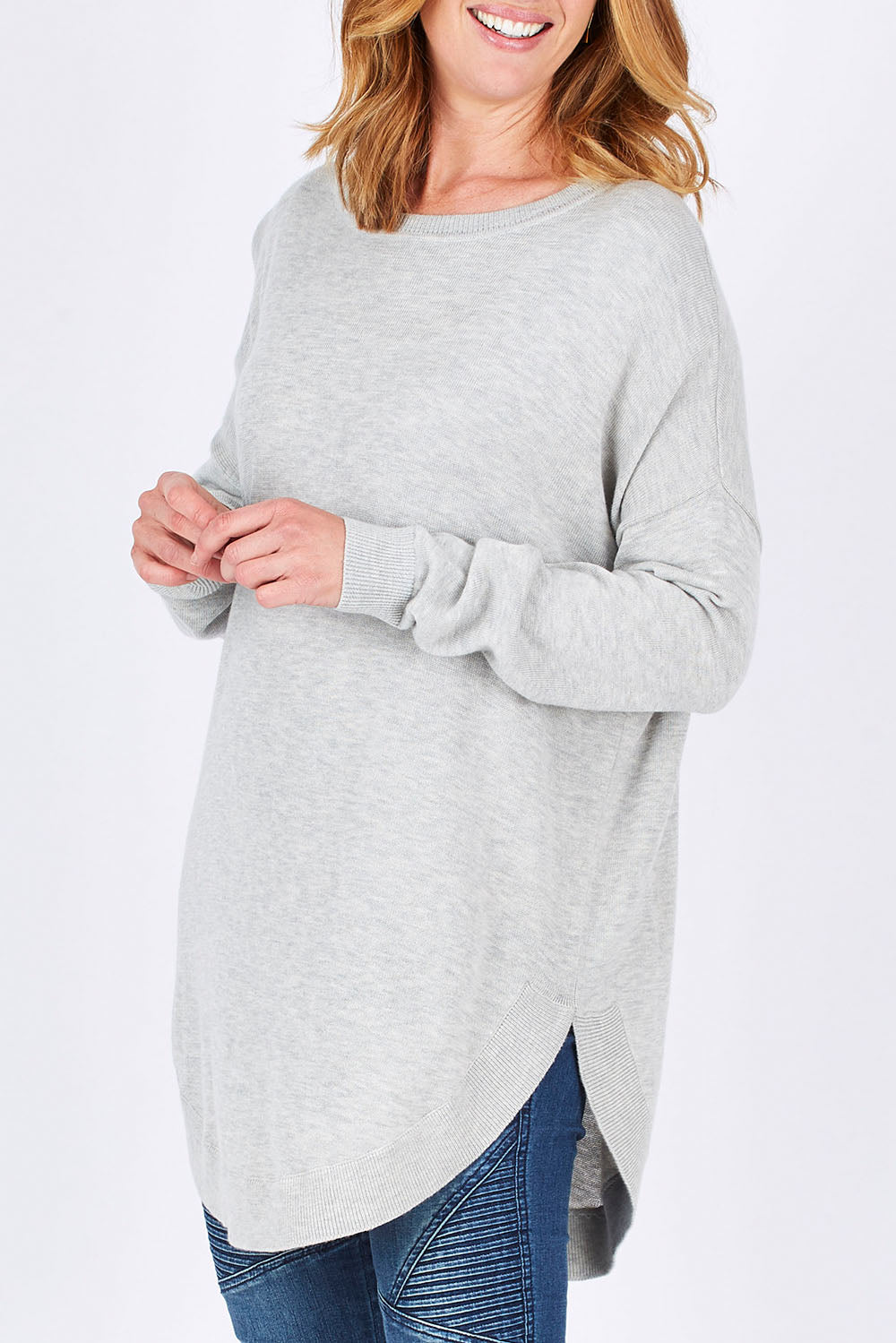 Model Katie wearing size OneSize of the Eden Knit in colour Marle (Grey), from the front, cropped image