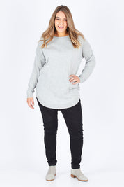 Model Natalia wearing size OneSize of the Eden Knit in colour Marle (Grey), from the front, showing the whole outfit