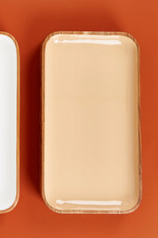 A model wearing size OneSize of the Savannah Platter in colour Peach, from the front, showing the whole outfit