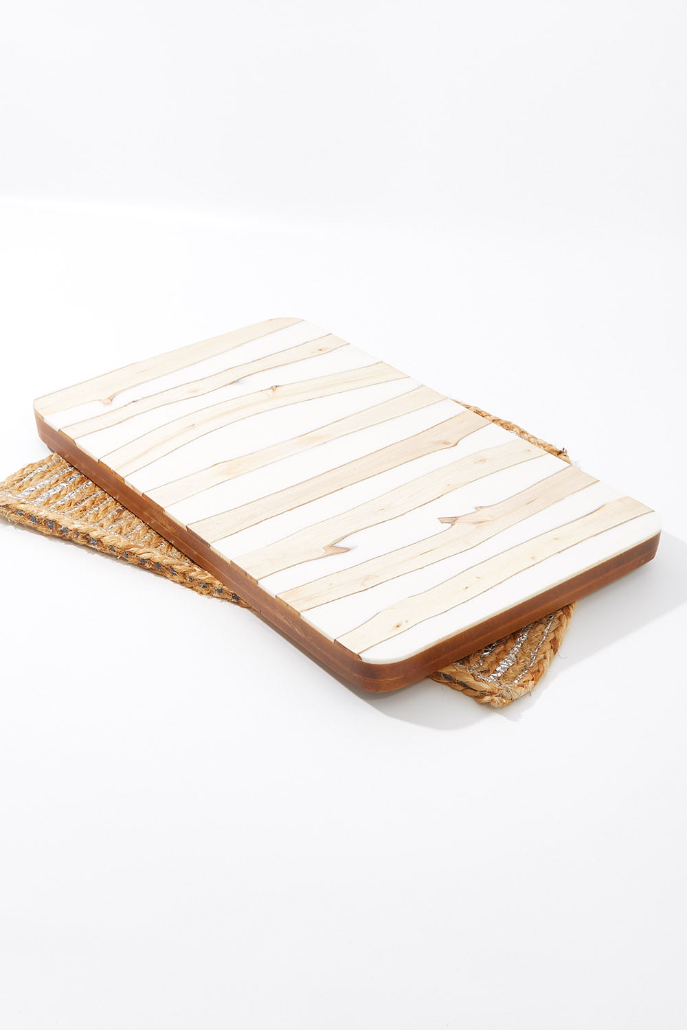 A model wearing size OneSize of the Chobe Plank Board in colour Natural, from the front, showing the whole outfit