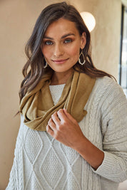 A model wearing size OneSize of the Astor Snood in colour Dijon, from the front, showing the whole outfit