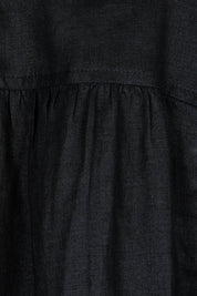 Product shot of the Studio Linen Tie Shirt in colour Ebony (Black), detail