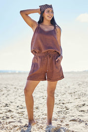 Model Eshan wearing size 10 of the Studio Linen Short – Chocolate in colour Chocolate, from the front