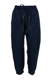 Product shot of the Studio Relaxed Linen Pant in colour Navy (Blue), from the front