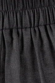 Product shot of the Studio Crop Pant in colour Ebony (Black), detail