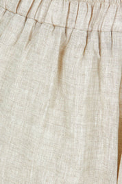 Product shot of the Studio Crop Pant in colour Tusk, detail