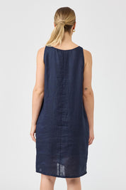 A model wearing the Studio Linen Midi Dress in colour Navy (Blue), from the back