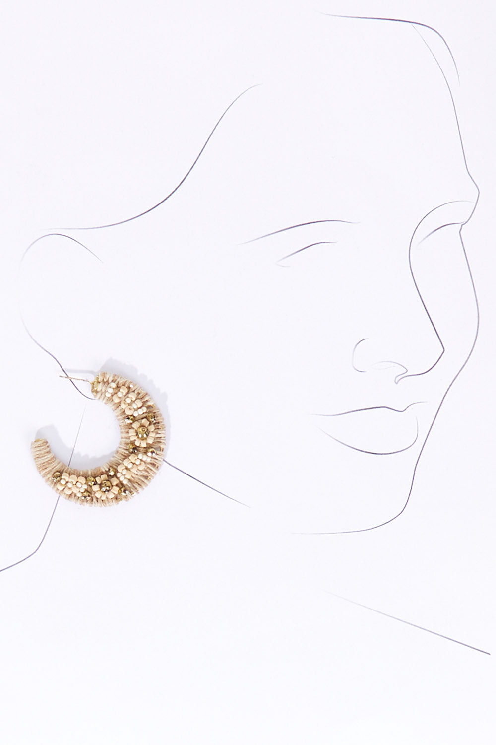 A model wearing size OneSize of the Soma Hoop Earring in colour Hoop (Metallics), from the front, showing the whole outfit