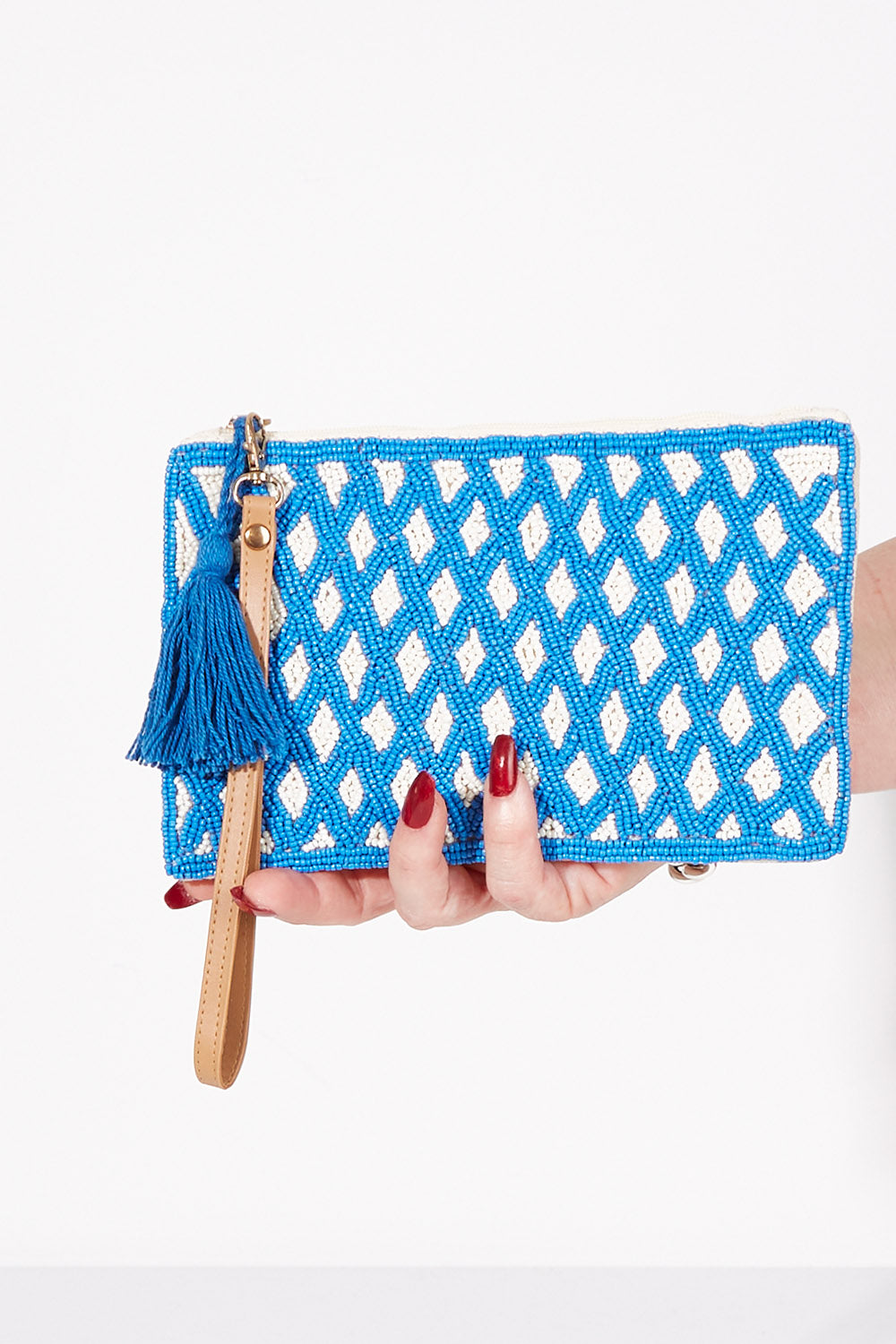 A model wearing size OneSize of the Eros Diamond Clutch in colour Capri (Blue), from the front, showing the whole outfit