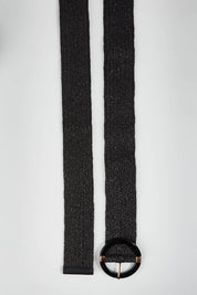 A model wearing size OneSize of the Acacia Belt in colour Black (Black), from the front, showing the whole outfit