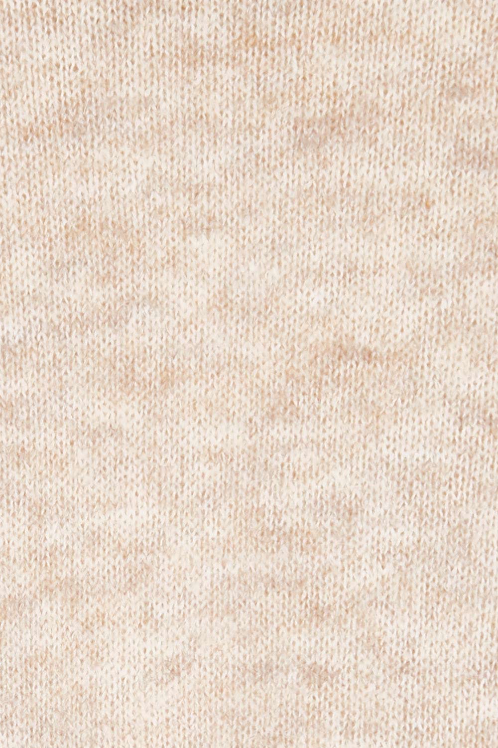 Product shot of the Kinsella Cardigan in colour Tusk, detail