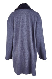 Product shot of the Klein Duster Coat in colour Denim (Blue), from the back
