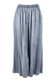 Product shot of the Elan Pant in colour Denim (Blue), from the front