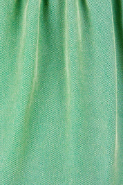 Product shot of the Elan Pant in colour Meadow (Green), detail