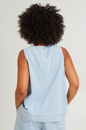 Model Olivia wearing size S of the Playa Cotton Tank in colour Capri (Blue), from the back