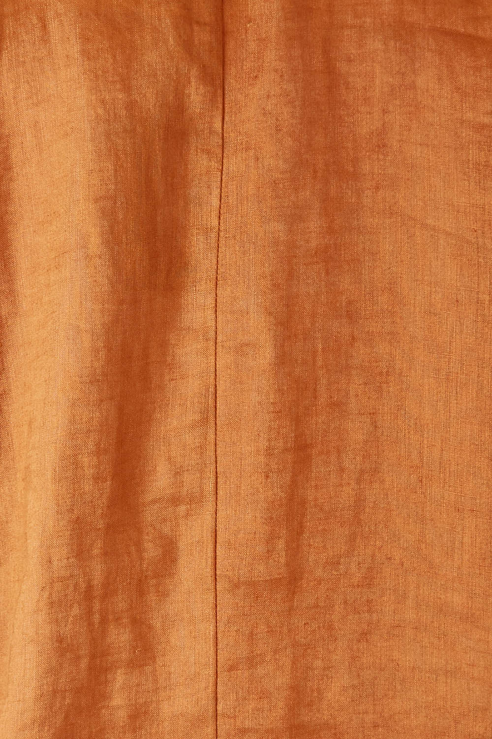 Product shot of the Nama Top in colour Ochre, detail