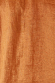 Product shot of the Nama Top in colour Ochre, detail