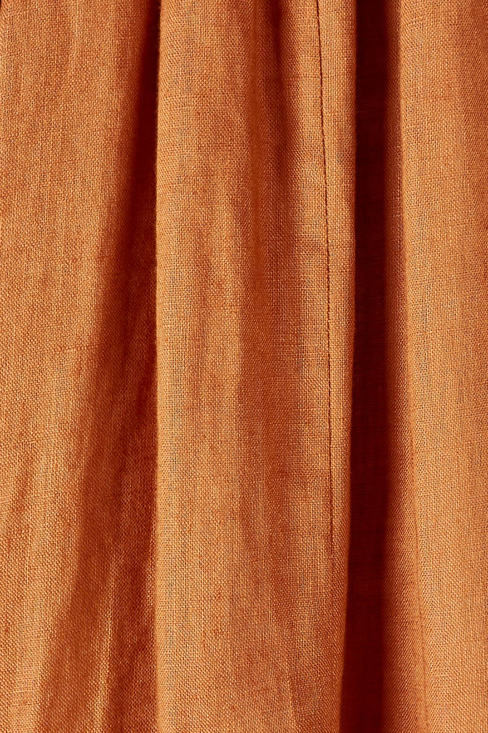Product shot of the Nama Dress in colour Ochre, detail