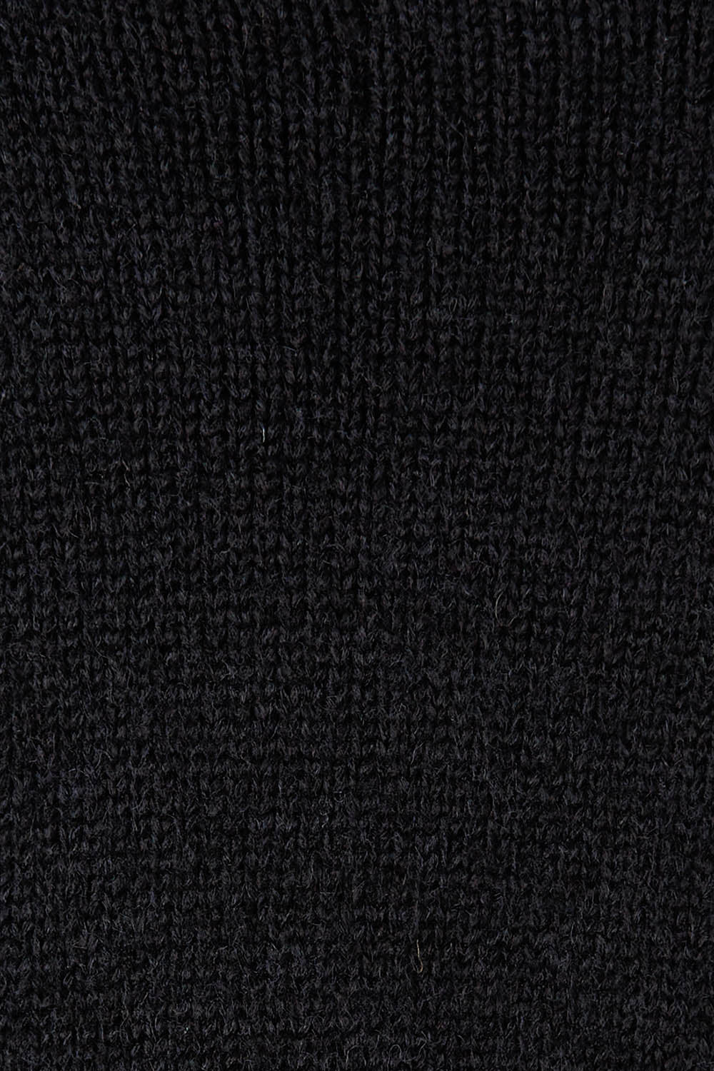 Product shot of the Parrl Crossover Knit in colour Ebony (Black), detail