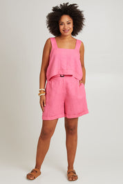 Model Olivia wearing size S of the Halcyon Linen Tank in colour Musk (Pink), from the front, showing the whole outfit