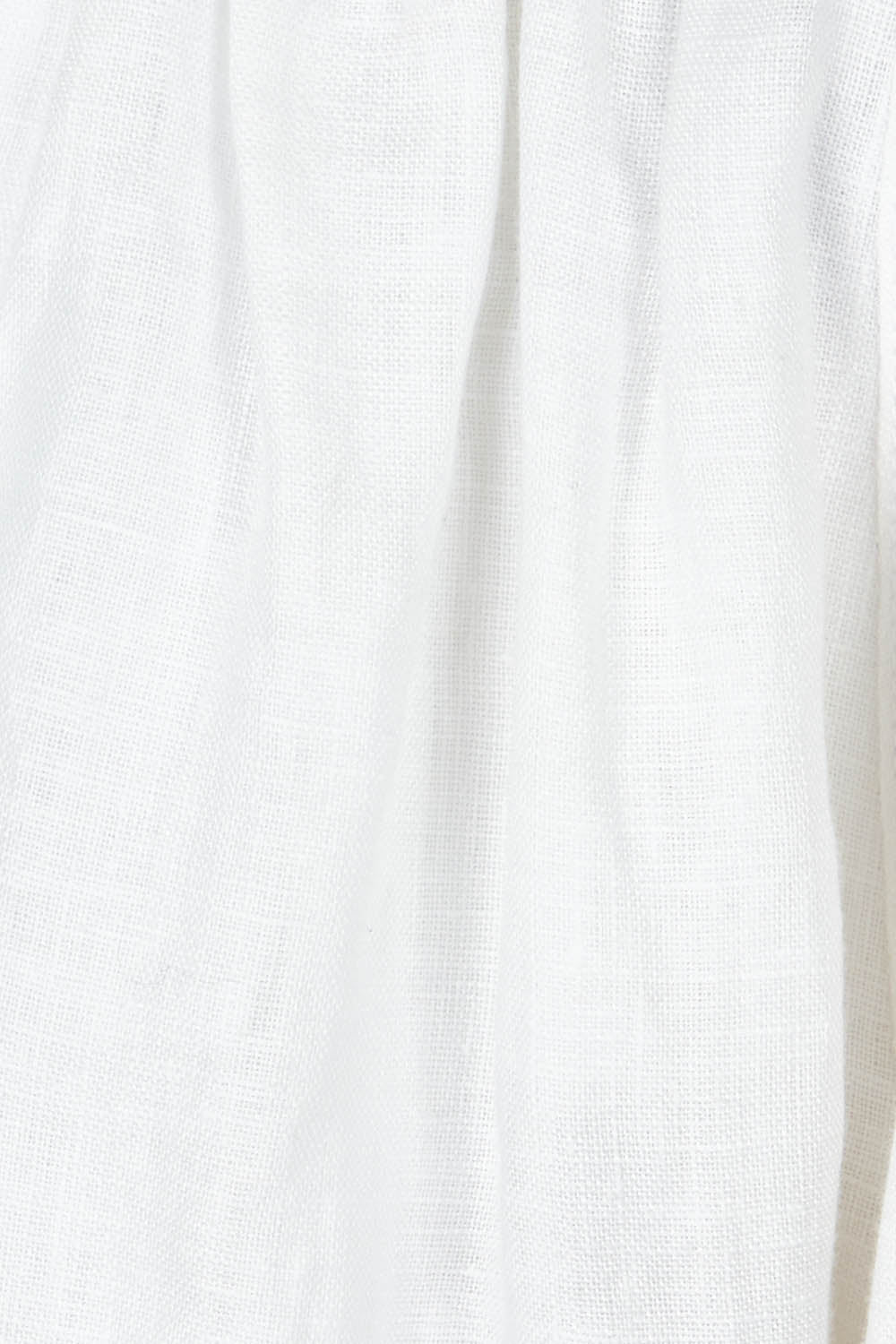Product shot of the Halcyon Linen Shorts in colour Opal (White), detail