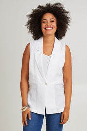 Model Olivia wearing size S of the Halcyon Linen Vest in colour Opal (White), from the front, cropped image