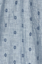 Product shot of the Zephyr Blouse in colour Nevada (Blue), detail