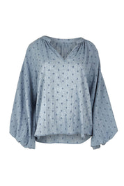 Product shot of the Zephyr Blouse in colour Nevada (Blue), from the front
