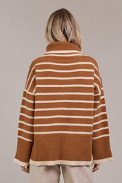 A model wearing the Katana Roll Neck Knit in colour Hazel, from the back