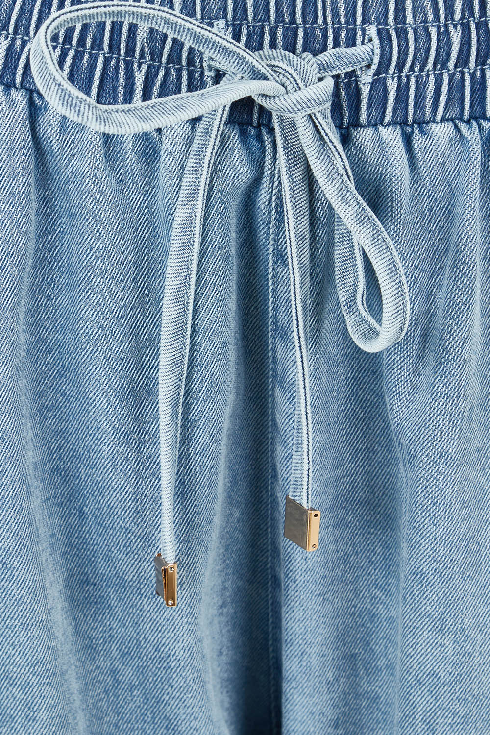 Product shot of the Pepi Relaxed Denim Pant in colour Denim (Blue), detail