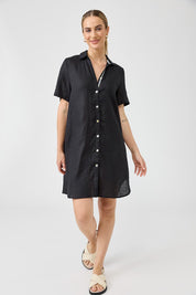 A model wearing the Studio Linen Short Shirt Dress in colour Black (Black), from the front, showing the whole outfit