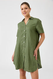 A model wearing the Studio Linen Short Shirt Dress in colour Khaki (Green), from the front, cropped image
